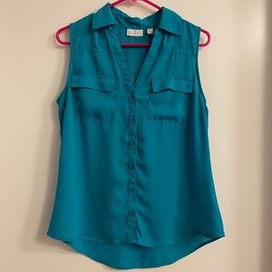 Blue button up sleeveless top
